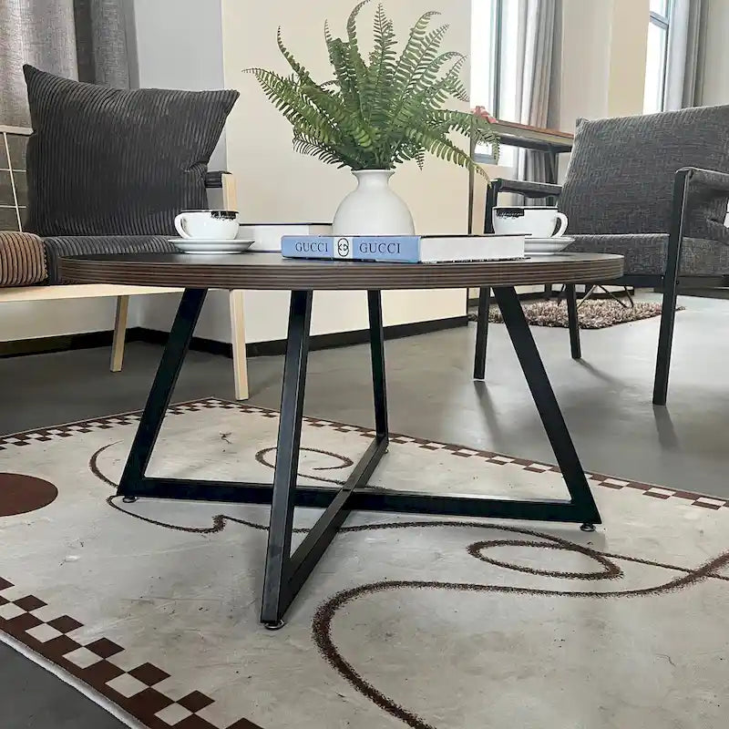 Table basse ronde moderne noire/marron avec pieds en métal en X et plateau en bois vieilli