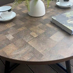 Table basse ronde moderne noire/marron avec pieds en métal en X et plateau en bois vieilli