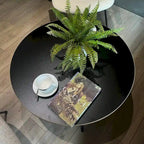 Table basse ronde moderne noire/marron avec pieds en métal en X et plateau en bois vieilli