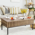 Table basse relevable, finition teck brun, avec compartiment de rangement dissimulé