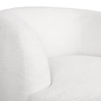 Fauteuil pivotant club en tissu bouclé blanc / beige / noir avec piètement en fer, une place