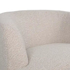 Fauteuil pivotant club en tissu bouclé blanc / beige / noir avec piètement en fer, une place