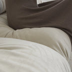 Causeuse minimaliste en velours beige/rose/gris, garnie de plumes et de mousse, 2 places